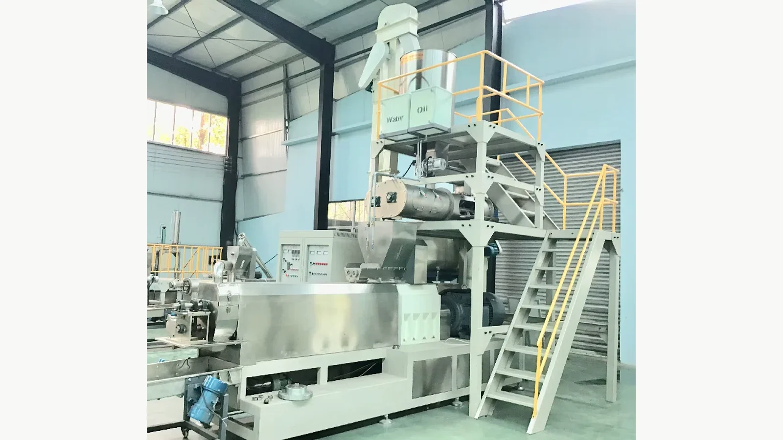 Twin-screw feed extrusion stage with associated process equipment and controls