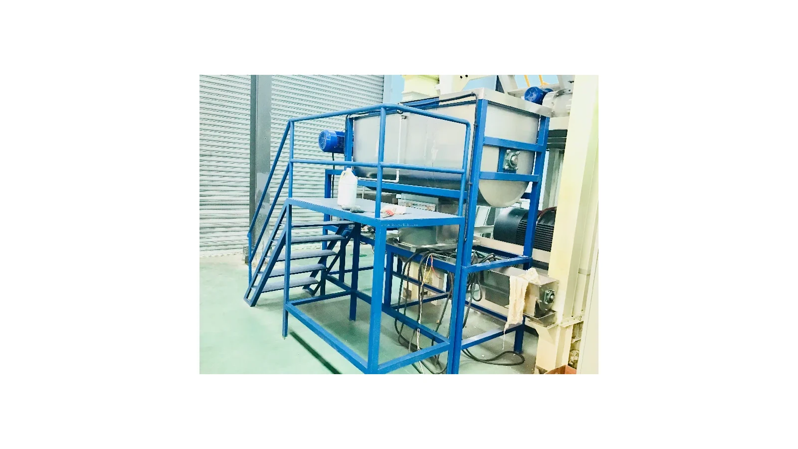 Feed mixer used to separate upstream preparation roles from extrusion roles